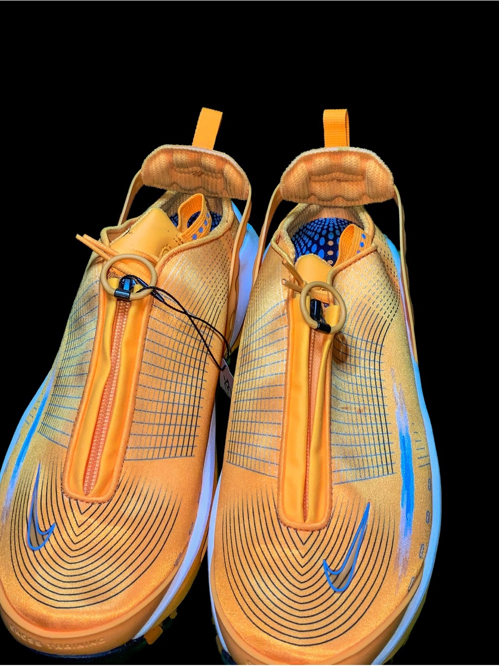 Nike Menβs Orange Sneakers with Blue Accents